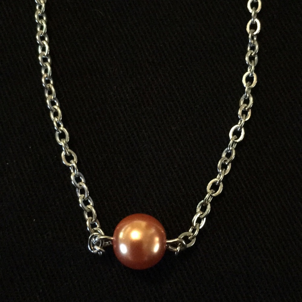 Harriet Ave Jewels orange pearl silver tone neck.